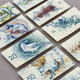 Illustration for article titled Gorgeous Banknotes Feature Flora, Fauna—And Skeletons Under UV Light